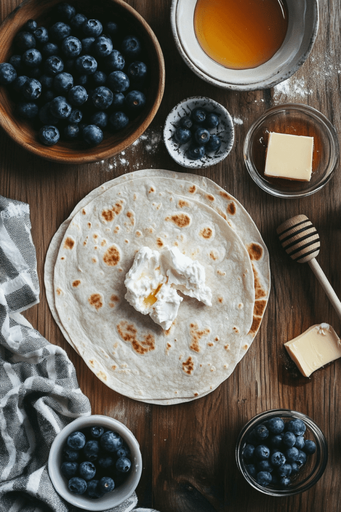 Ingredients for blueberry breakfast quesadilla laid out