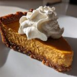 Silky Pumpkin Pie with Gingersnap Crust and Whipped Cream